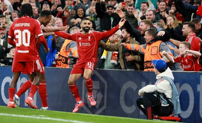 Liverpool FC v Atletico de Madrid - UEFA Champions League 2025 26 League Phase MD1 Jeremie Frimpong, Ryan Gravenberch and Mohamed Salah of Liverpool celebrates 2nd goal during the UEFA Champions League 2025 26 League Phase MD1 match between Liverpool FC and Atletico de Madrid at Anfield on September 17, 2025 in Liverpool, England. Liverpool Anfield England United Kingdom Copyright: xRichardxSellers Sportsphoto APLx 14135105