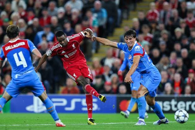 Liverpool, England, 17th September 2025. Alexander Isak of Liverpool has a shot at goal during the Liverpool vs Atletico Madrid UEFA Champions League match at Anfield, Liverpool. Picture credit should read: James Baylis Sportimage EDITORIAL USE ONLY. No use with unauthorised audio, video, data, fixture lists, club league logos or live services. Online in-match use limited to 120 images, no video emulation. No use in betting, games or single club league player publications. SPI_051_JB_LIV_ATM_ SPI-4140-0051