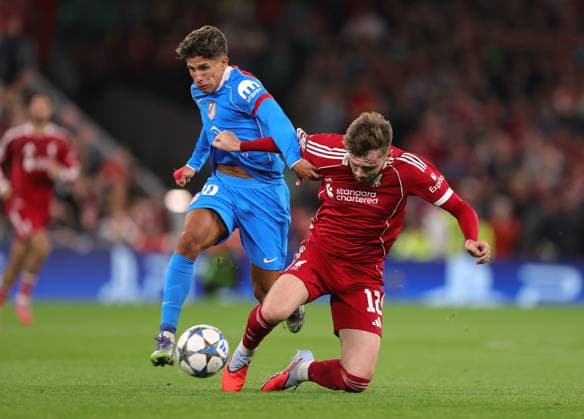 Football - UEFA Champions League - League Phase - Liverpool v Atletico Madrid 17th September 2025 - UEFA Champions League - League Phase - Liverpool v Atletico Madrid - Giuliano Simeone of Atletico Madrid fouls Conor Bradley of Liverpool - Photo: Simon Stacpoole Offside. Liverpool UK Copyright: xSimonxStacpoolexOffside
