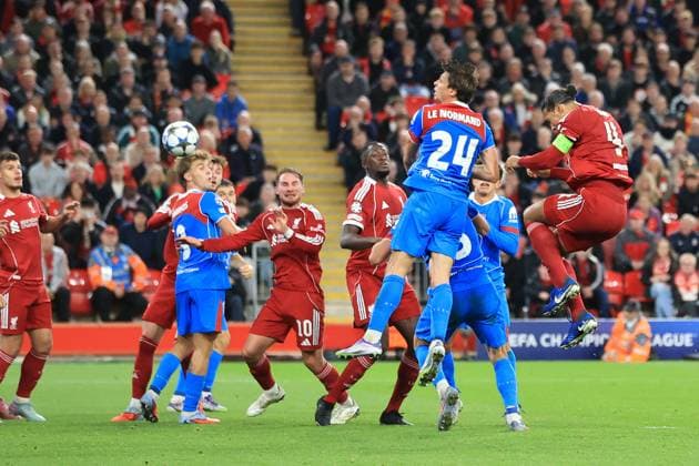 17th September 2025; Anfield, Liverpool, Merseyside, England; UEFA Champions League Football, Liverpool versus Atletico Madrid; Virgil van Dijk of Liverpool beats Atletico Madrid goalkeeper Jan Oblak with a header for 3-2 after 2 minutes of added time  DavidxBlunsden