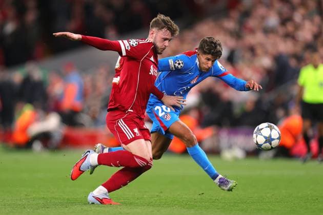 Football - UEFA Champions League - League Phase - Liverpool v Atletico Madrid 17th September 2025 - UEFA Champions League - League Phase - Liverpool v Atletico Madrid - Connor Bradley of Liverpool and Giuliano Simeone of Atletico Madrid - Photo: Simon Stacpoole Offside. Liverpool UK Copyright: xSimonxStacpoolexOffside