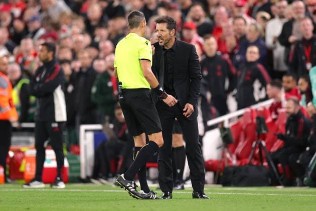 Football - UEFA Champions League - League Phase - Liverpool v Atletico Madrid 17th September 2025 - UEFA Champions League - League Phase - Liverpool v Atletico Madrid - Referee Maurizio Mariani and Atletico Madrid coach Diego Simeone argue - Photo: Simon Stacpoole Offside. Liverpool UK Copyright: xSimonxStacpoolexOffside