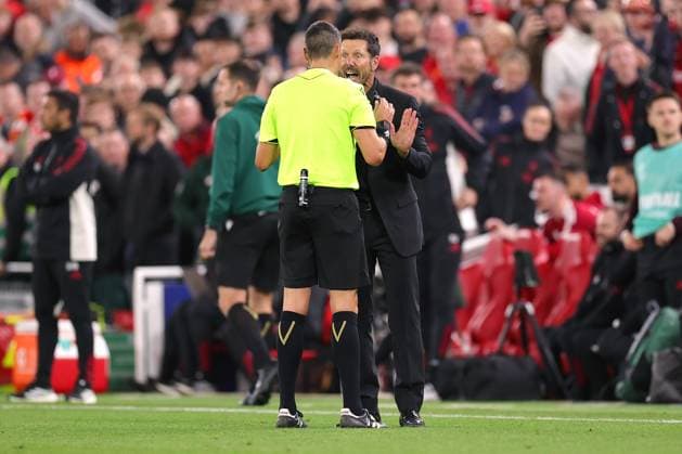 Football - UEFA Champions League - League Phase - Liverpool v Atletico Madrid 17th September 2025 - UEFA Champions League - League Phase - Liverpool v Atletico Madrid - Referee Maurizio Mariani and Atletico Madrid coach Diego Simeone argue - Photo: Simon Stacpoole Offside. Liverpool UK Copyright: xSimonxStacpoolexOffside