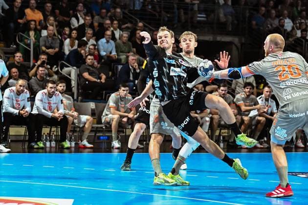 18.09.2025, xlakx, Handball, EHF Champions League, Fuechse Berlin - Aalborg Handbold v.l. Mathias Gidsel (Fuechse Berlin) setzt zum Sprungwurf an Berlin