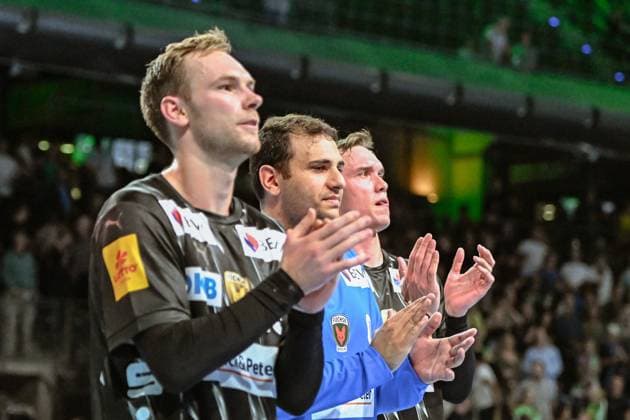 18.09.2025, xlakx, Handball, EHF Champions League, Fuechse Berlin - Aalborg Handbold v.l. Mathias Gidsel (Fuechse Berlin), Dejan Milosavljev (Fuechse Berlin), Lasse Andersson (Fuechse Berlin) Jubel ueber den Sieg, Jubel nach Spielende Berlin