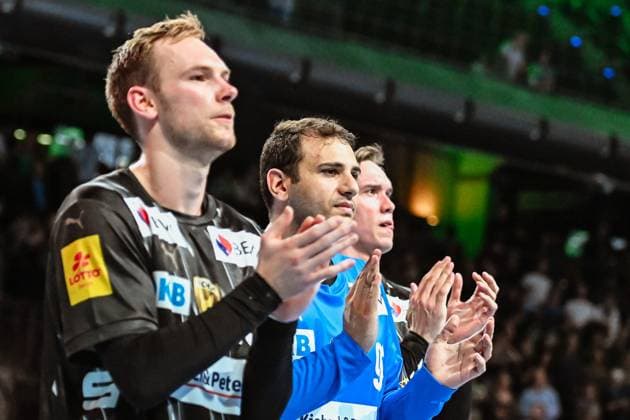 18.09.2025, xlakx, Handball, EHF Champions League, Fuechse Berlin - Aalborg Handbold v.l. Mathias Gidsel (Fuechse Berlin), Dejan Milosavljev (Fuechse Berlin), Lasse Andersson (Fuechse Berlin) Jubel ueber den Sieg, Jubel nach Spielende Berlin
