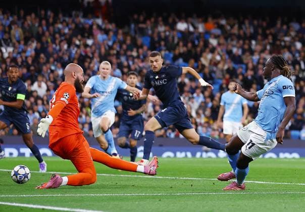 Jeremy Doku of Manchester City scores a goal to make it 2-0 Manchester City v Napoli, UEFA Champions League, Group Stage, Football, Etihad Stadium, Manchester, UK - 18 Sep 2025Manchester Etihad Stadium United Kingdom EDITORIAL USE ONLY No use with unauthorised audio, video, data, fixture lists, club league logos or live services. Online in-match use limited to 120 images, no video emulation. No use in betting, games or single club league player publications.  Copyright: xMattxWest Shutterstockx 15486943at