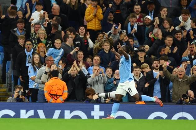 September 18, 2025, Manchester, Naples, England: Jero my Doku of Manchester City celebrates after scoring their second gol during the UEFA Champions League 2025 26 League Phase MD1 match between Manchester City and SSC Napoli at Etihad Stadium on September 18, 2025 in Manchester, England Manchester England - ZUMAl131 20250918_zsp_l131_037 Copyright: xCiroxDexLucax