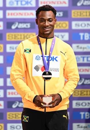(250920) -- TOKYO, Sept. 20, 2025 -- Bronze medalist Bryan Levell of Jamaica reacts during the men s 200m awarding ceremony at the 2025 World Athletics Championships in Tokyo, Japan, Sept. 20, 2025. ) (SP)JAPAN-TOKYO-ATHLETICS-WORLD ATHLETICS CHAMPIONSHIPS-MEN S 200M-AWARDING CEREMONY JiangxHan 