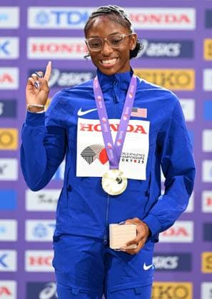 (250920) -- TOKYO, Sept. 20, 2025 -- Gold medalist Melissa Jefferson-Wooden of the United States poses during the awarding ceremony of the women s 200m at the 2025 World Athletics Championships in Tokyo, Japan, Sept. 20, 2025. ) (SP)JAPAN-TOKYO-ATHLETICS-WORLD ATHLETICS CHAMPIONSHIPS-WOMEN S 200M-AWARDING CEREMONY JiangxHan 