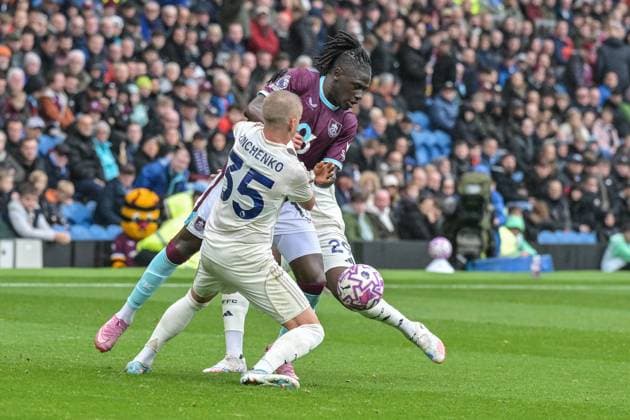 20th September 2025; Turf Moor, Burnley, Lancashire, England; Premier League Football, Burnley versus Nottingham Forest; Oleksandr Zinchenko of Nottingham Forest tussles with Loum Tchaouna of Burnley  LeexDurkin