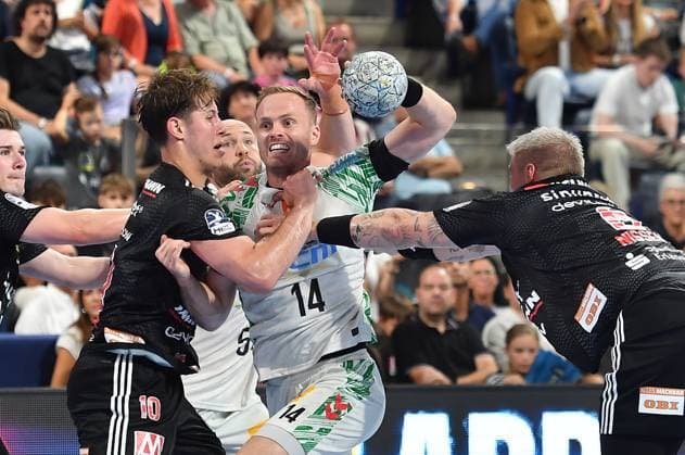 20.09.2025 - Handball - 1. Bundesliga DAIKIN HBL - Saison 2024 2025 - 5. Spieltag: HC Erlangen Metropolregion Nürnberg HCE - SC Magdeburg - OGo - xogox - Florian Scheerer (10, HC Erlangen HCE ) Omar Ingi Magnusson (14, SC Magdeburg ) Marek Nissen (6, HC Erlangen HCE )