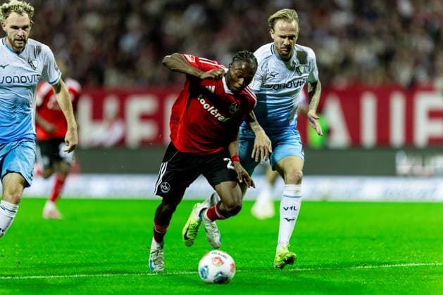 Fussball, Saison 2025 2026, 2. Bundesliga, Max Morlock Stadion, 6. Spieltag, 1. FC Nürnberg - VfL Bochum, 20.09.2025 20.09.2025, Fussball, Saison 2025 2026, 2. Bundesliga, Max Morlock Stadion, 6. Spieltag, 1. FC Nürnberg - VfL Bochum, v.l. 23 Mohamed Ali Zoma (1. FC Nürnberg), 7 Kevin Vogt (VfL Bochum) Foto: Lucca Fundel Nürnberg Max Morlock Stadion Bayern Deutschland
