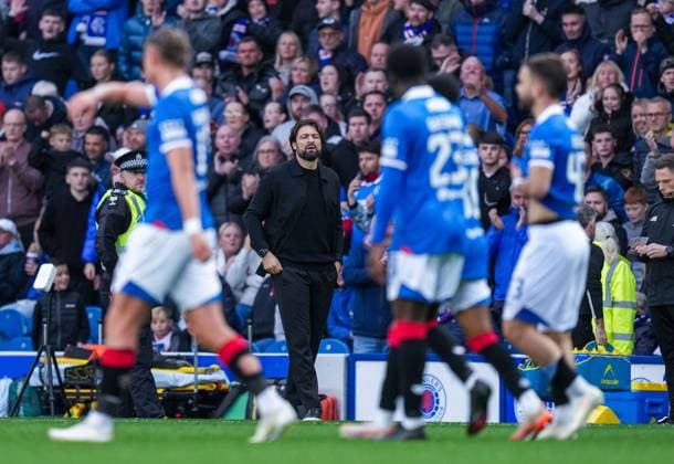 Rangers Manager Russell Martin looks towards his players while Nicolas Raskin of Rangers celebrates with team mates after scoring to give Rangers a 1-0 lead. Rangers v Hibernian, Premier Sports Cup, Quarter Final, Football, Ibrox Stadium, Glasgow, Scotland, UK - 20 Sep 2025Glasgow Ibrox Stadium United Kingdom EDITORIAL USE ONLY No use with unauthorised audio, video, data, fixture lists, club league logos or live services. Online in-match use limited to 120 images, no video emulation. No use in betting, games or single club league player publications.  Copyright: xStuartxWallace Shutterstockx 15487048de