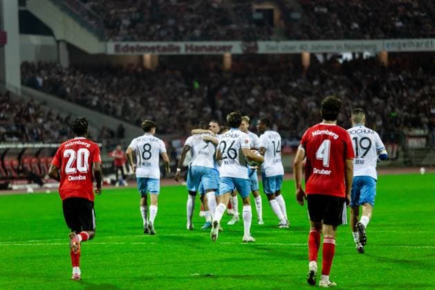 Fussball, Saison 2025 2026, 2. Bundesliga, Max Morlock Stadion, 6. Spieltag, 1. FC Nürnberg - VfL Bochum, 20.09.2025 20.09.2025, Fussball, Saison 2025 2026, 2. Bundesliga, Max Morlock Stadion, 6. Spieltag, 1. FC Nürnberg - VfL Bochum, Torjubel Jubel Freude nach Treffer Tor Torschuss zum 1:1 durch 9 Ibrahim Sissoko (VfL Bochum). 26 Romario Rösch (VfL Bochum) Foto: Lucca Fundel Nürnberg Max Morlock Stadion Bayern Deutschland