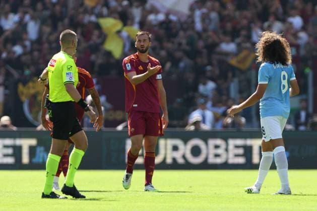 CALCIO - Serie A - SS Lazio vs AS Roma Rome, Italy September 21, 2025: Bryan Cristante of Roma, Matteo Guendouzi of Lazio seen in action before the Serie A Enilive 2025-2026 football derby match between SS Lazio and AS Roma at Olympic Stadium. Rome Italy  Copyright: xIPAxSport ABACAx
