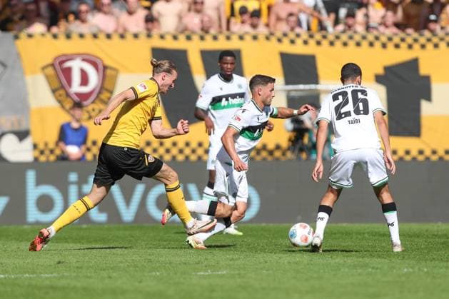 21.09.2025, xtgx, Fussball - 2.Bundesliga Dynamo Dresden - Hannover 96 emspor, v.l. Vinko Sapina (Dresden, 5), Benedikt Pichler (Hannover, 11) Zweikampf, Duell, Kampf, tackle (DFL DFB REGULATIONS PROHIBIT ANY USE OF PHOTOGRAPHS as IMAGE SEQUENCES and or QUASI-VIDEO) Dresden