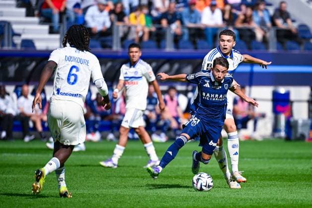 FOOTBALL : Paris FC vs Strasbourg - Ligue 1 - 21 09 2025 Ilan KEBBAL ( 10 - PFC ) and Martial Godo ( 20 - Strasbourg ) during the Ligue 1 match between Paris FC and RC Strasbourg Alsace at Stade Jean Bouin on September 21, 2025 in Paris, France. ( Photo by Federico Pestellini PsnewZ ) - ParisFrance  Copyright: xFedericoxPestellinix