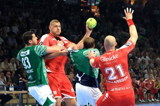 DEU, DHB, 1.HBL, Fuechse Berlin vs. Melsungen, 21.09.2025, Max-Schmeling-Halle, Berlin, DEU, DHB, 1.HBL, Fuechse Berlin vs. Melsungen, im Bild Mijajlo Marsenic (Fuechse Berlin 93), Max Darj (Fuechse Berlin 5), Dainis Kristopans (MT Melsungen 10), Arnar Freyr Arnarsson (MT Melsungen 21)