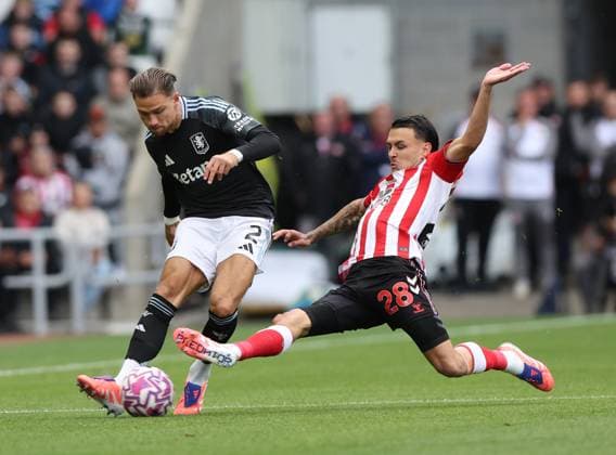 Sunderland, England, 21st September 2025. Enzo Le Fee (R) of Sunderland in action with Matty Cash of Aston Villa during the Sunderland vs Aston Villa Premier League match at the Stadium Of Light, Sunderland. Picture credit should read: Nigel Roddis Sportimage EDITORIAL USE ONLY. No use with unauthorised audio, video, data, fixture lists, club league logos or live services. Online in-match use limited to 120 images, no video emulation. No use in betting, games or single club league player publications. SPI_007_NR_NEWC_ASTO SPI-4153-0006