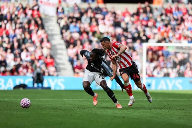 Sunderland, England, 21st September 2025. Granit Xhaka (R) of Sunderland in action with Evann Guessand of Aston Villa during the Sunderland vs Aston Villa Premier League match at the Stadium Of Light, Sunderland. Picture credit should read: Nigel Roddis Sportimage EDITORIAL USE ONLY. No use with unauthorised audio, video, data, fixture lists, club league logos or live services. Online in-match use limited to 120 images, no video emulation. No use in betting, games or single club league player publications. SPI_021_NR_NEWC_ASTO SPI-4153-0020