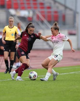 21.09.2025 - Fussball - Saison 2025 2026 - 1. Google Pixel Frauen Bundesliga - 03. Spieltag: 1. FC Nürnberg FCN ( Club Clubfrauen ) - Bayer 04 Leverkusen - Sportfoto Zink DaMa - xdaxma - Sanja Homann (19, 1. FC Nürnberg FCN ) Kristin Kögel Koegel (11, Bayer 04 Leverkusen )