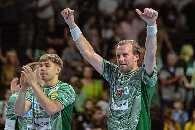 21.09.2025, xlakx, Handball Daikin HBL, Fuechse Berlin - MT Melsungen v.l. Max Guenther (Fuechse Berlin), Max Darj (Fuechse Berlin) Jubel ueber den Sieg, Jubel nach Spielende Berlin