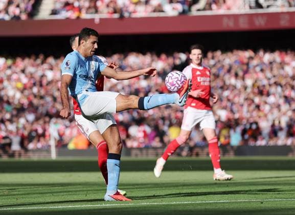 London, England, 21st September 2025. Rodri of Manchester City clears the ball during the Arsenal vs Manchester City Premier League match at the Emirates Stadium, London. Picture credit should read: David Klein Sportimage EDITORIAL USE ONLY. No use with unauthorised audio, video, data, fixture lists, club league logos or live services. Online in-match use limited to 120 images, no video emulation. No use in betting, games or single club league player publications. SPI_018_DK_Arsenal_Man_City SPI-4152-0020