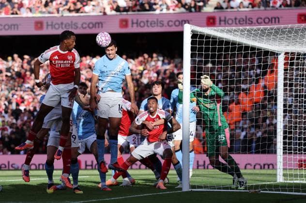 London, England, 21st September 2025. Rodri of Manchester City heads clear from a corner kick during the Arsenal vs Manchester City Premier League match at the Emirates Stadium, London. Picture credit should read: David Klein Sportimage EDITORIAL USE ONLY. No use with unauthorised audio, video, data, fixture lists, club league logos or live services. Online in-match use limited to 120 images, no video emulation. No use in betting, games or single club league player publications. SPI_028_DK_Arsenal_Man_City SPI-4152-0034