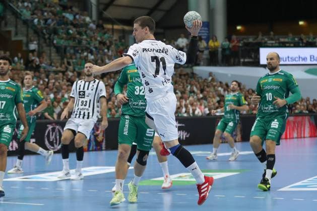 21.09.2025, xtgx, Handball - Daikin HBL, SC DHfK Leipzig - THW Kiel emspor, v.l. Elias Ellefsen a Skipagotu (Kiel, 71) wirft Tor, Torschuetze, erzielt Tor, Treffer, scores the goal Leipzig
