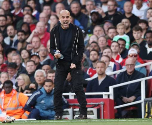 London, England, 21st September 2025. Pep Guardiola coach of Manchester City rages on the touchline during the Arsenal vs Manchester City Premier League match at the Emirates Stadium, London. Picture credit should read: David Klein Sportimage EDITORIAL USE ONLY. No use with unauthorised audio, video, data, fixture lists, club league logos or live services. Online in-match use limited to 120 images, no video emulation. No use in betting, games or single club league player publications. SPI_055_DK_Arsenal_Man_City SPI-4152-0054