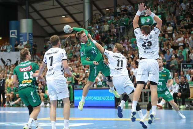 Handball DAIKIN HBL: SC DHfK Leipzig vs. THW Kiel; 21.09.2025 Franz Semper (32, SC DHfK Leipzig) holt zum Wurf aus. Handball, DAIKIN HBL, 1. Bundesliga, Saison 2025 2026, 5. Spieltag: SC DHfK Leipzig vs. THW Kiel am 21.09.2025 in der Quarterback Immobilien Arena Leipzig. Copyright: xBEAUTIFULxSPORTS JanxKaeferx