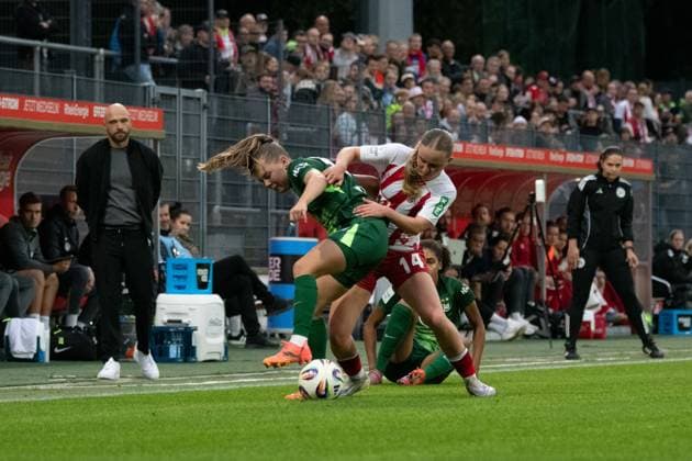 Janou Levels (15 VfL Wolfsburg) and Carlotta Imping (14 1. FC Köln) during the Google Pixel Frauen-Bundesliga between 1. FC Köln v. VfL Wolfsburg and VfL Wolfsburg at Franz-Kremer-Stadion in Cologne, Germany. Copyright: xQianruxZhang SPPx Sportspressphoto_SPR30045