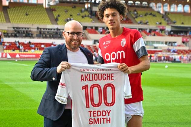 FOOTBALL : MONACO vs METZ - ligue 1 - 21 9 25 Monaco™s midfielder 11 Maghnes Akliouche receives a jersey from Tiago Scuro for his 100th match with AS Monaco during the French L1 2025-2026 season football match between AS Monaco and FC Metz at Louis II stadium of Monaco, south France, on September 21, 2025. MONACOMonaco  Copyright: xfredxDIDES psnewzx