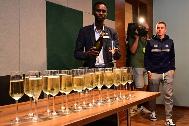 Belgian Remco Evenepoel and celebrations glasses pictured at the hotel of Belgian team after the podium of Evenepoel and Van Wilder earlier today at the Men Elite Individual Time Trial race (40,8km) at the cycling road world championships, in Kigali, Rwanda, Sunday 21 September 2025. The 2025 UCI Road World Championships take place from 21 to 28 September in Kigali, Rwanda. DIRKxWAEM  x134936711x