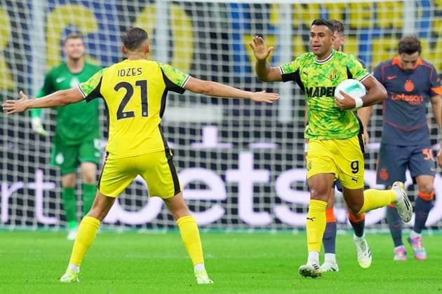 Sassuolo s Walid Cheddira celebrates after scoring 2-0 during the Serie A soccer match between Inter and Sassuolo at the San Siro Stadium in Milan , north Italy - Sunday , September 21 , 2025. - Soccer .  Copyright: xSpada LaPressex