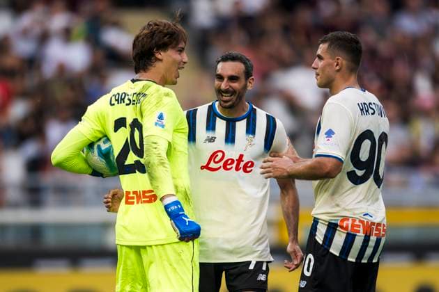 Torino FC v Atalanta BC - Serie A Marco Carnesecchi of Atalanta BC celebrates with Davide Zappacosta and Nikola Krstovic of Atalanta BC after saving a penalty kick during the Serie A football match between Torino FC and Atalanta BC. Turin Italy Copyright: xNicolòxCampox