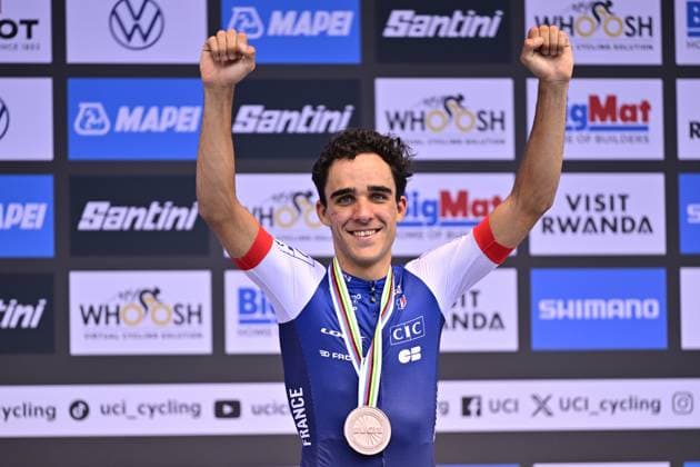 French Maxime Decomble celebrates on the podium with his bronze medal, after the Men U23 Individual Time Trial race (31,2km) at the cycling road world championships, in Kigali, Rwanda, Monday 22 September 2025. The 2025 UCI Road World Championships take place from 21 to 28 September in Kigali, Rwanda. DIRKxWAEM  x135009544x
