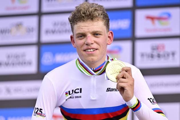 Dutch Michiel Mouris celebrates on the podium after winning the Men Junior Individual Time Trial race (22,6km) at the cycling road world championships, in Kigali, Rwanda, Tuesday 23 September 2025. The 2025 UCI Road World Championships take place from 21 to 28 September in Kigali, Rwanda. DIRKxWAEM  x135080931x