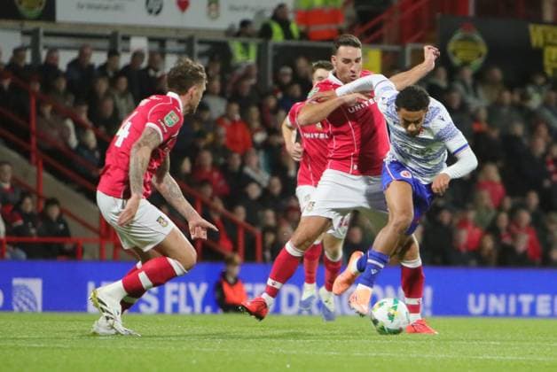 Wrexham FC v Reading EFL Cup 23 09 2025. Matthew James of Wrexham and Andre Garcia of Reading during the EFL Cup match between Wrexham FC and Reading at the Racecourse Ground, Wrexham, United Kingdom on 23 September 2025. Wrexham Racecourse Ground Wales United Kingdom Editorial use only DataCo restrictions apply See www.football-dataco.com , Copyright: xAlunxRobertsx PSI-22905-0014