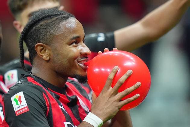 AC Milan s Christopher Nkunku celebrates after scoring 2-0 during the round of 32 Frecciarossa Italian Cup 2025 2026 soccer match between Milan and Lecce at San Siro Stadium in Milan , North Italy , Tuesday , September 23 , 2025 . - Soccer  Copyright: xSpada LaPressex
