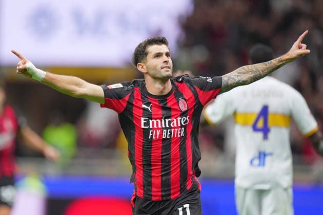 AC Milan s Christian Pulisic celebrates after scoring 3-0 during the round of 32 Frecciarossa Italian Cup 2025 2026 soccer match between Milan and Lecce at San Siro Stadium in Milan , North Italy , Tuesday , September 23 , 2025 . - Soccer  Copyright: xSpada LaPressex