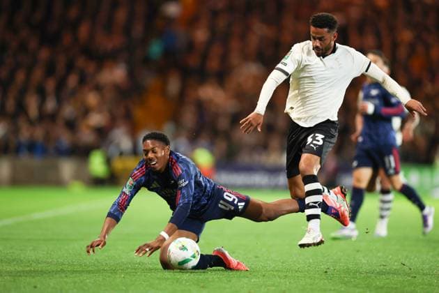 George Hall of Port Vale and Myles Lewis-Skelly of Arsenal Port Vale v Arsenal, EFL Carabao Cup, Third Round, Football, Vale Park, Stoke-on-Trent, UK - 24 Sep 2025Stoke-on-Trent Vale Park United Kingdom EDITORIAL USE ONLY No use with unauthorised audio, video, data, fixture lists, club league logos or live services. Online in-match use limited to 120 images, no video emulation. No use in betting, games or single club league player publications. Copyright: xRyanxBrowne Shutterstockx 15498606am