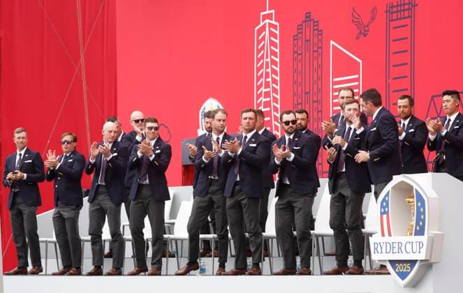 Members of Team United States applaud on stage during the opening ceremony for the 45th Ryder Cup at The Black Course at Bethpage State Park in Farmingdale, New York, on Wednesday, September 24, 2025. The three-day golf tournament starts on Friday, September 26, 2025.  RYD20250924824 JOHNxANGELILLO