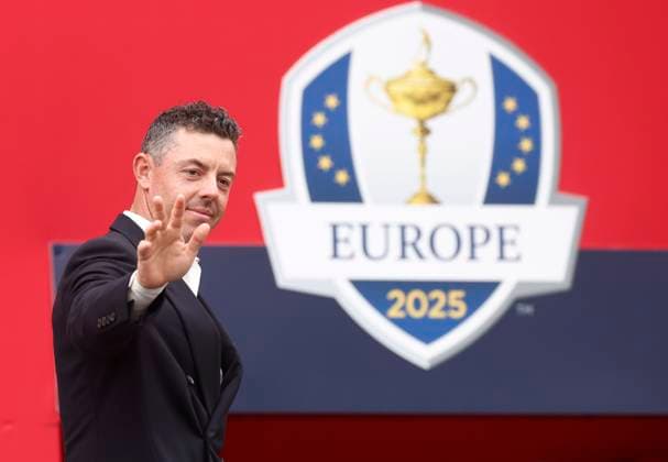 Rory McIlroy of Team Europe waves during the opening ceremony for the 45th Ryder Cup at The Black Course at Bethpage State Park in Farmingdale, New York, on Wednesday, September 24, 2025. The three-day golf tournament starts on Friday, September 26, 2025.  RYD20250924825 JOHNxANGELILLO