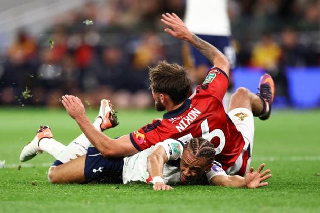 Tottenham Hotspur v Doncaster Rovers 24 September 2025, London - Carabao Cup - Third Round - Tottenham Hotspur v Doncaster Rovers - Xavi Simons of Tottenham Hotspur and Tom Nixon of Doncaster Rovers - Photo: Jacques Feeney Offside. London UK Copyright: xJacquesxFeeneyx xOffsidexOffside