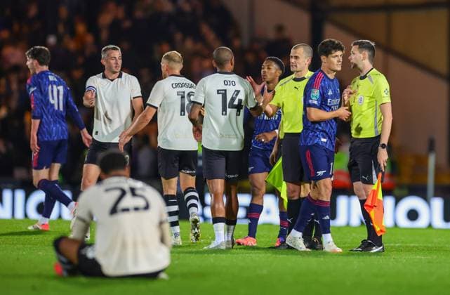 24th September 2025; Vale Park, Stoke, Staffordshire, England; EFL Carabao Cup Football, Port Vale versus Arsenal; Players shake hands after the 2-0 win for Arsenal  RogerxEvans