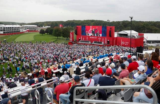 Rory McIlroy of Team Europe waves to the crowd during the opening ceremony for the 45th Ryder Cup at The Black Course at Bethpage State Park in Farmingdale, New York, on Wednesday, September 24, 2025. The three-day golf tournament starts on Friday, September 26, 2025.  RYD20250924833 JOHNxANGELILLO