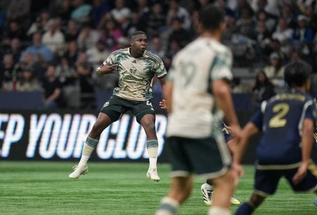 September 24, 2025, Vancouver, Bc, CANADA: Portland Timbers Kamal Miller (4) watches his shot as he scores against the Vancouver Whitecaps during the first half of an MLS, Fussball Herren, USA soccer match, in Vancouver, on Wednesday, September 24, 2025. Canada News - September 24, 2025 - ZUMAc35_ 20250924_zaf_c35_225 Copyright: xDarrylxDyckx