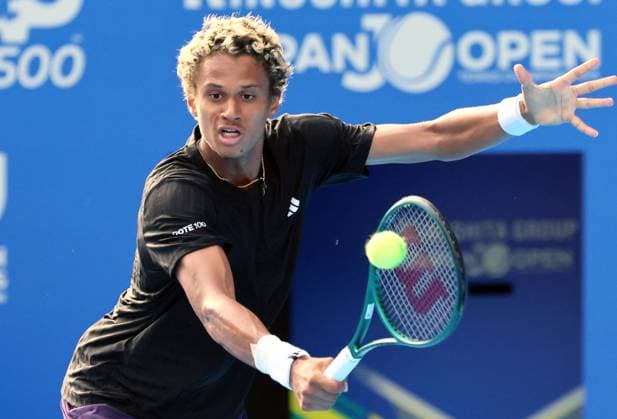 September 25, 2025, Tokyo, Japan - gabriel Diallo of Canad returns the ball against Taylor Fritz of the United States during single round 32 at the the Japan Open Tennis tournament in Tokyo on Thursday, September 25, 2025. Fritz defeated Diallo 4-6, 6-3, 7-6. (photo by Yoshio Tsunoda AFLO) Noxthirdxpartyxsales  aflo_304714342